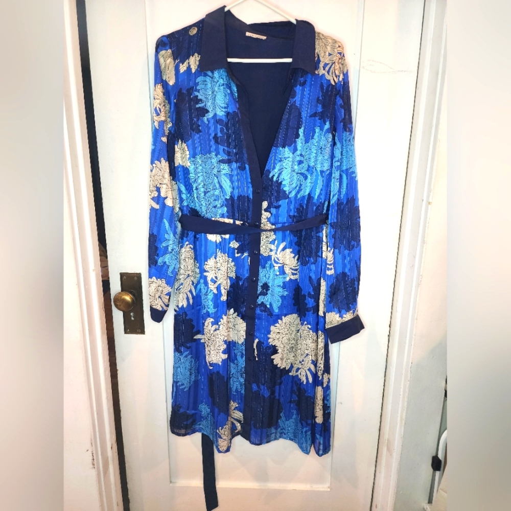 Dress with flowers, collar, buttons, and waist sash